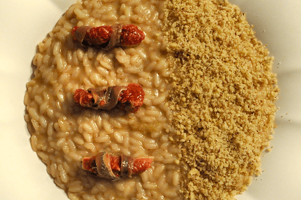 Risotto ai Fichi, con granella di Noci e filetti di Acciuga