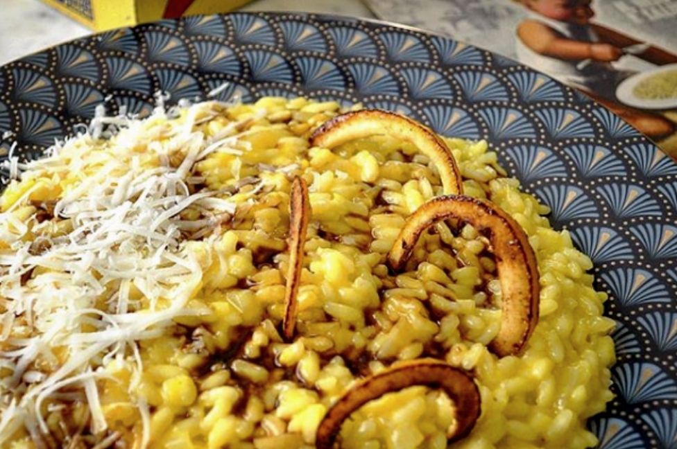 Risotto zafferano, arance, pecorino e liquirizia